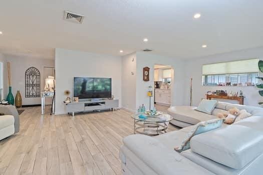 living room with light hardwood / wood-style floors