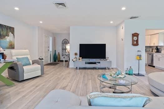 living room featuring light wood-type flooring