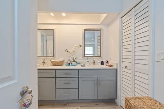 bathroom with vanity and hardwood / wood-style floors