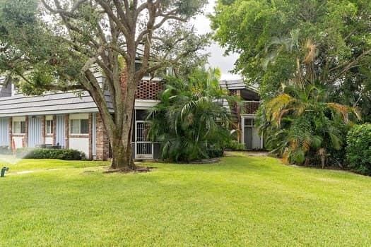 view of front of property with a front lawn