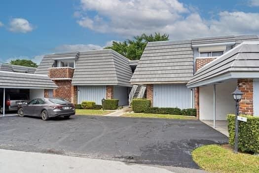 view of building exterior with a carport