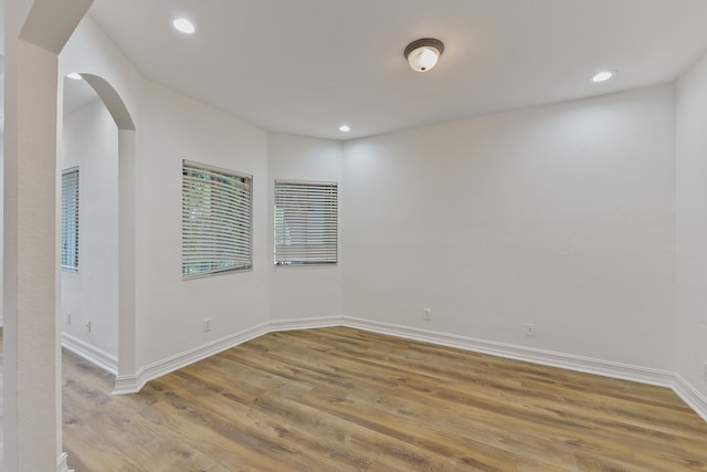 empty room featuring hardwood / wood-style flooring