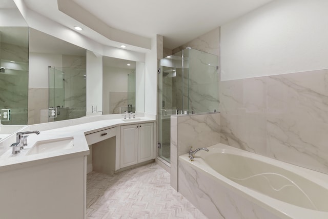 bathroom featuring vanity and plus walk in shower