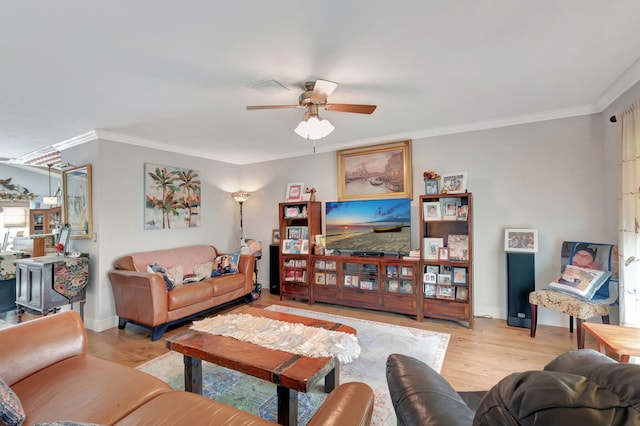 living room featuring light hardwood / wood-style flooring, ceiling fan, and crown molding