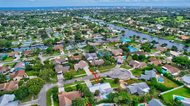 drone / aerial view with a water view