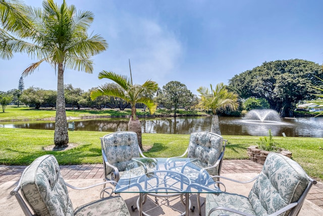 view of patio featuring a water view