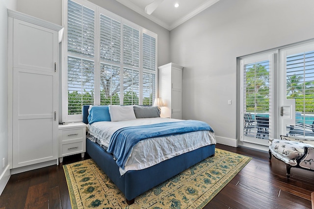 bedroom with ceiling fan, dark hardwood / wood-style floors, crown molding, and access to outside