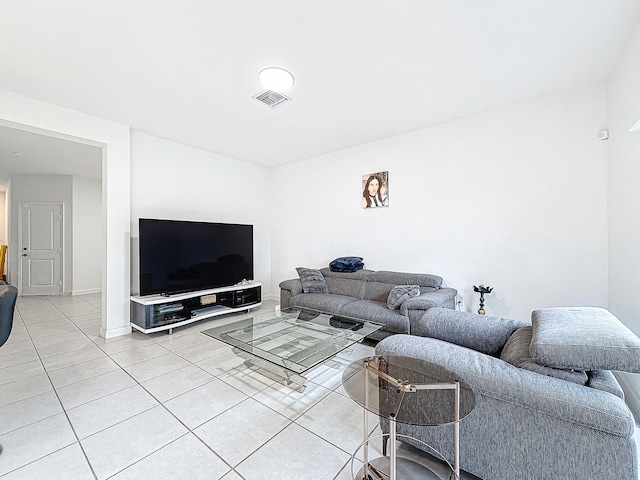 living room with light tile patterned floors