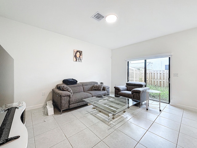 living room with light tile patterned flooring