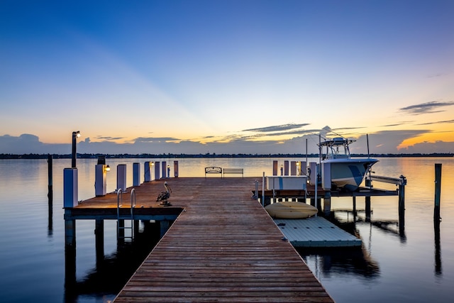 view of dock with a water view