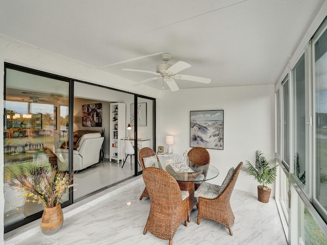 dining area with ceiling fan