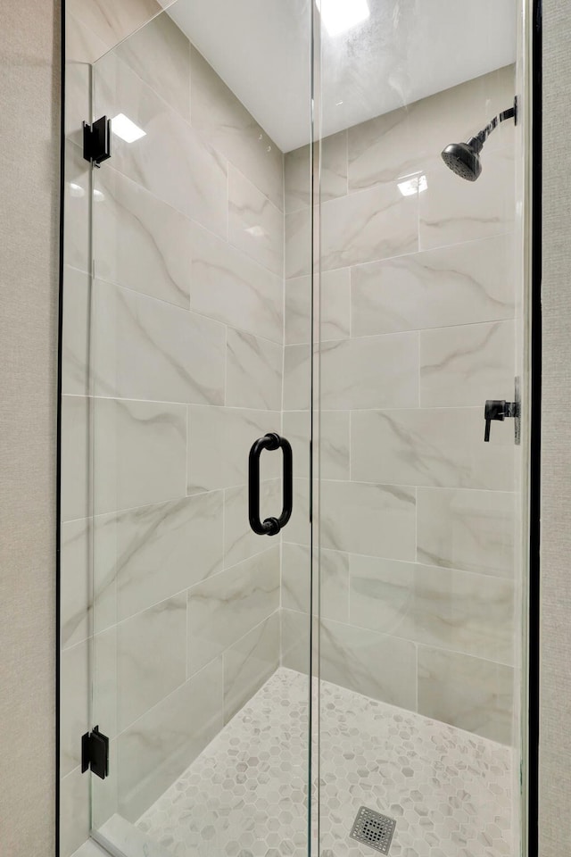 bathroom with an enclosed shower