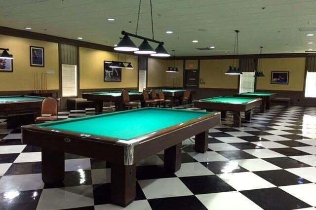 game room with a wainscoted wall, billiards, and tile patterned floors