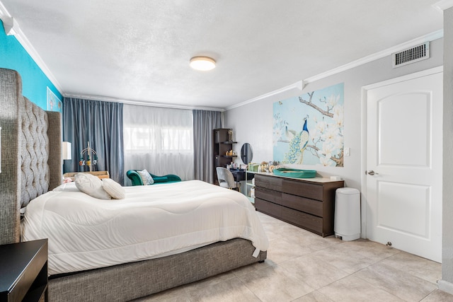 bedroom featuring crown molding, a textured ceiling, and light tile patterned flooring