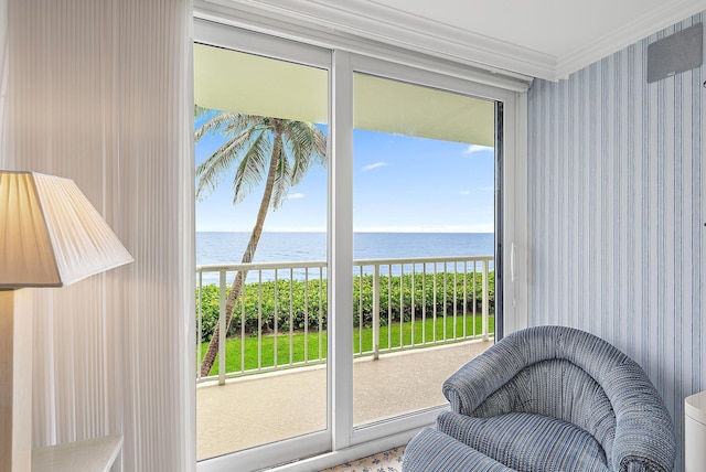 interior space with plenty of natural light and a water view