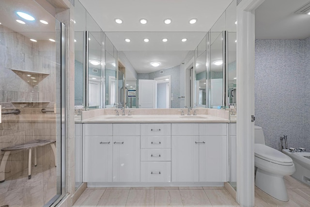 bathroom featuring an enclosed shower, vanity, a bidet, tile patterned flooring, and toilet