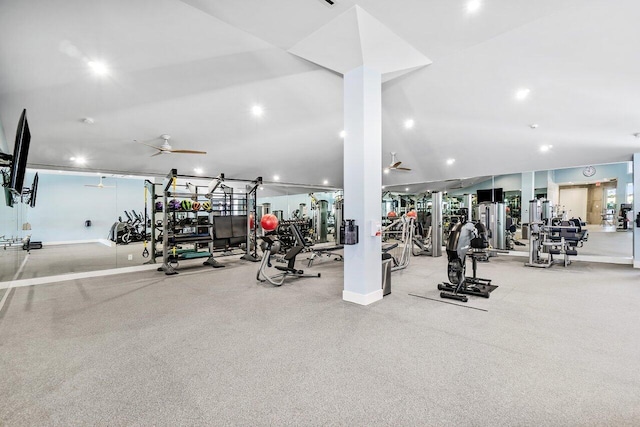 exercise room featuring ceiling fan and vaulted ceiling