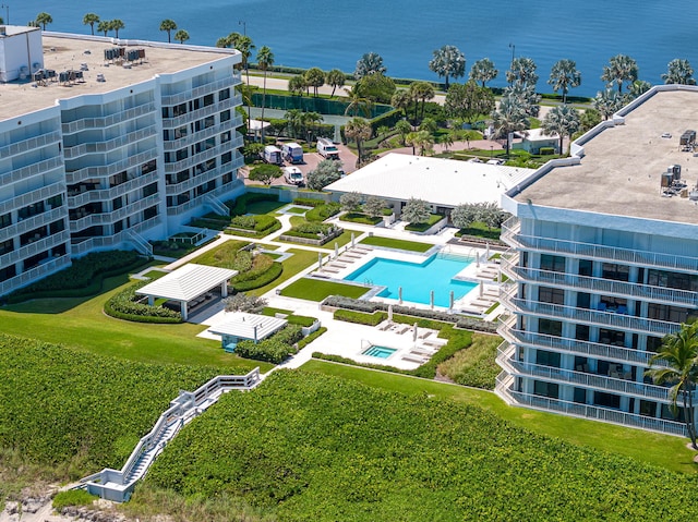 birds eye view of property featuring a water view