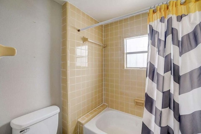 2511 W Abdella St, Tampa, FL 33607 - bathroom featuring toilet and shower / bathtub combination with curtain