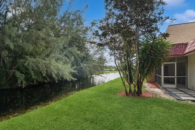 view of yard featuring a water view