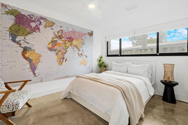 bedroom featuring concrete flooring and ceiling fan