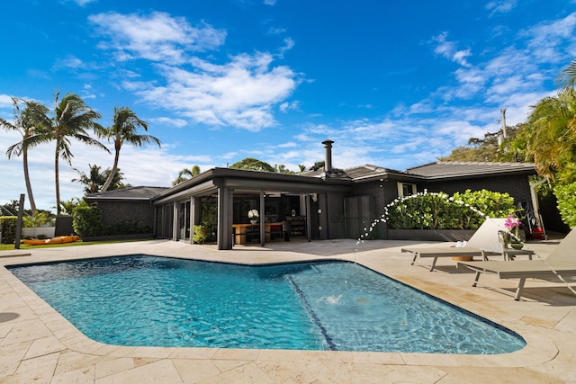 view of pool with a patio area