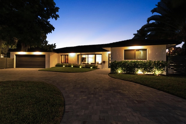 view of front of property featuring a garage