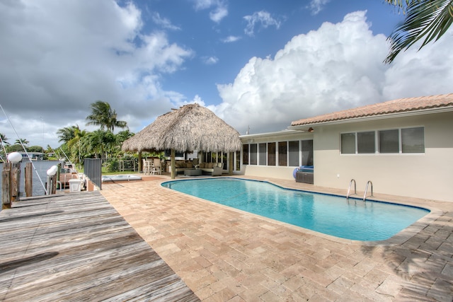 view of pool featuring a gazebo and a patio