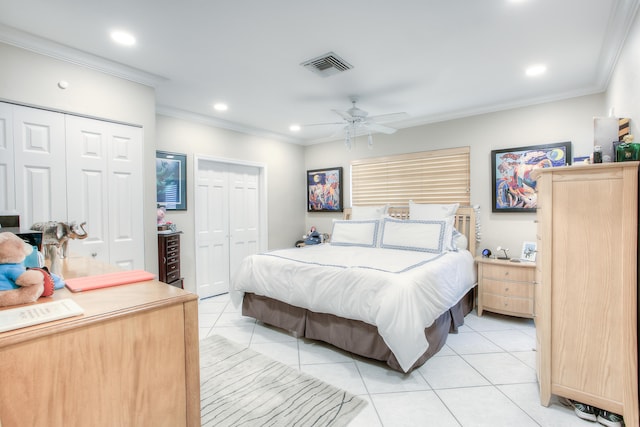 bedroom featuring ceiling fan, ornamental molding, and light tile patterned floors