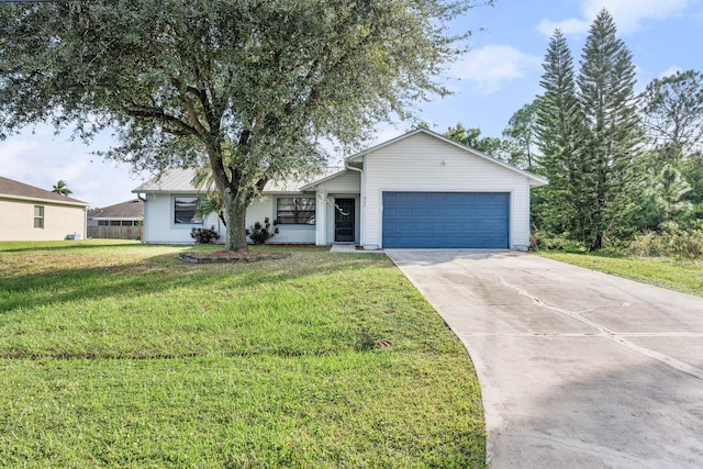 single story home with a front yard and a garage