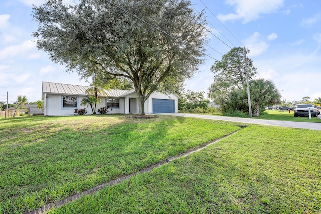 ranch-style house with a front lawn and a garage