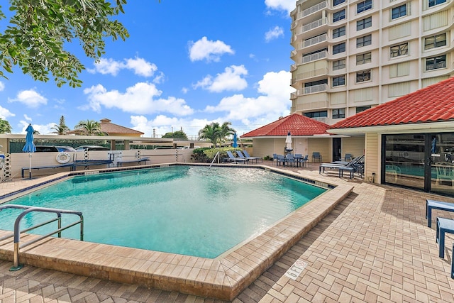 view of pool with a patio area