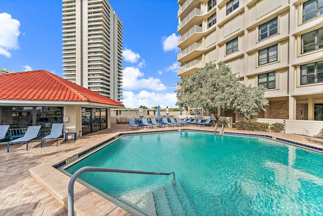 view of pool featuring a patio area