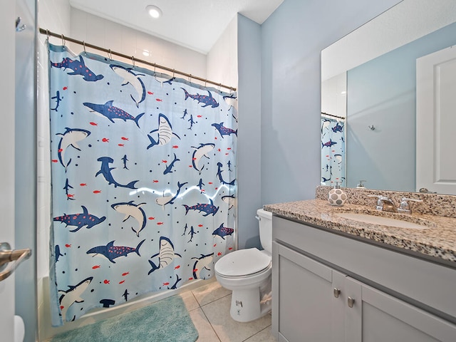 full bathroom with vanity, toilet, shower / bathtub combination with curtain, and tile patterned flooring