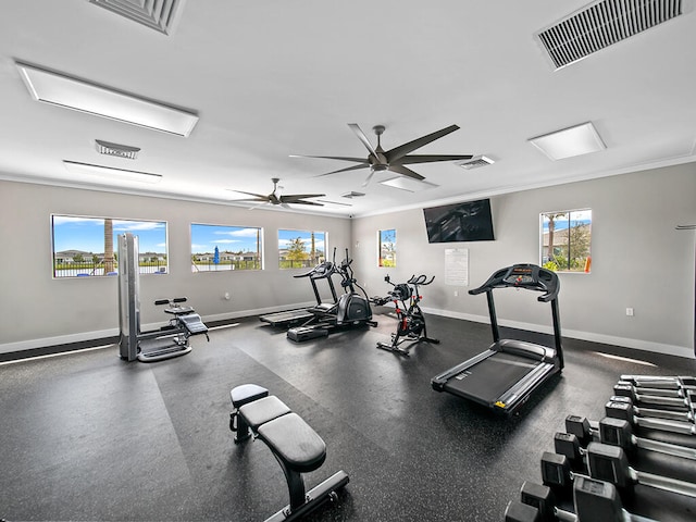 gym with ceiling fan and ornamental molding