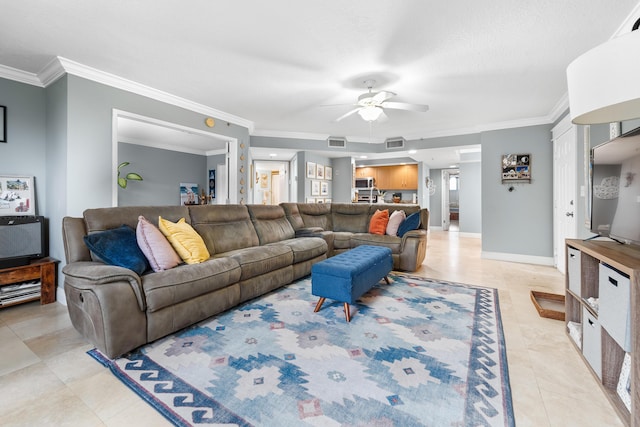 living room with ceiling fan, crown molding, and light tile patterned flooring