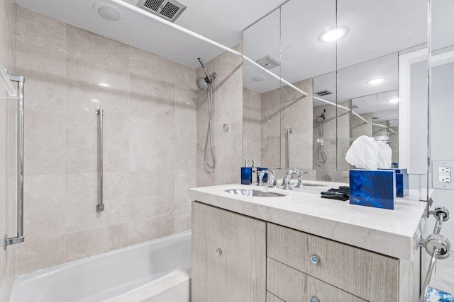 44 Cocoanut Row Unit 120B, Palm Beach, FL 33480 - full bathroom featuring vanity and tiled shower / bath combo