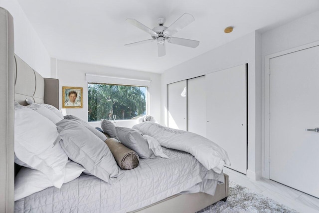 44 Cocoanut Row Unit 120B, Palm Beach, FL 33480 - bedroom with light marble finish floors, a closet, and ceiling fan