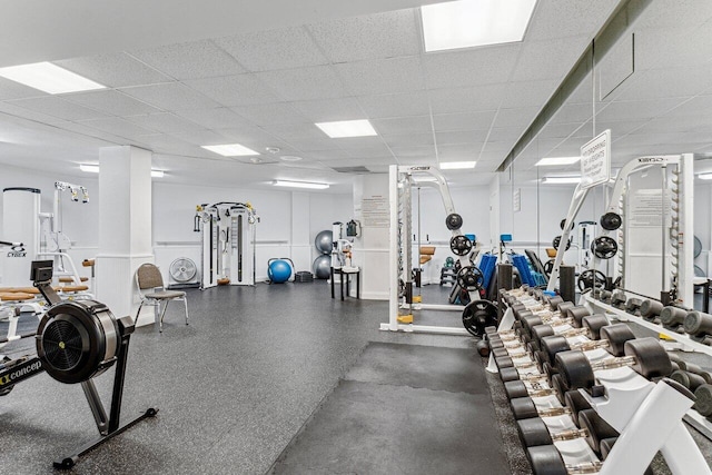 workout area with a drop ceiling