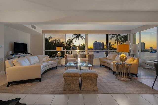 living room with tile patterned flooring