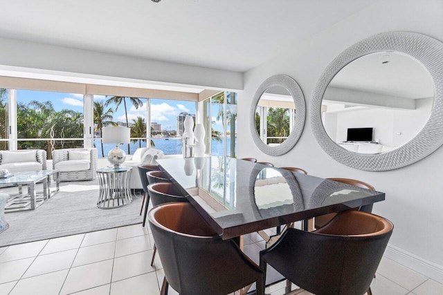 dining space with light tile patterned floors