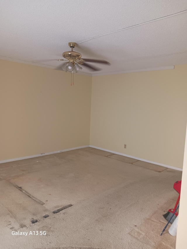 110 Northampton Unit F, West Palm Beach, FL 33417 - empty room with crown molding, carpet floors, a textured ceiling, a ceiling fan, and baseboards