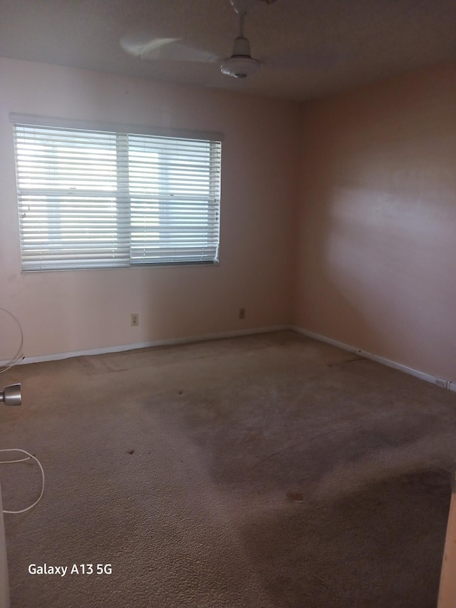 110 Northampton Unit F, West Palm Beach, FL 33417 - empty room with baseboards and carpet flooring