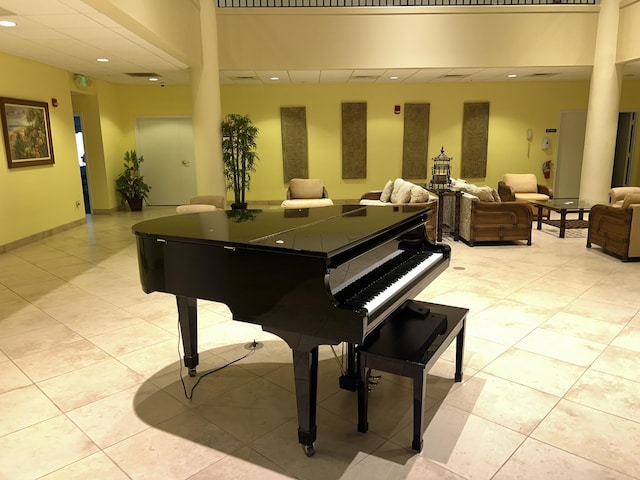 misc room with light tile patterned floors