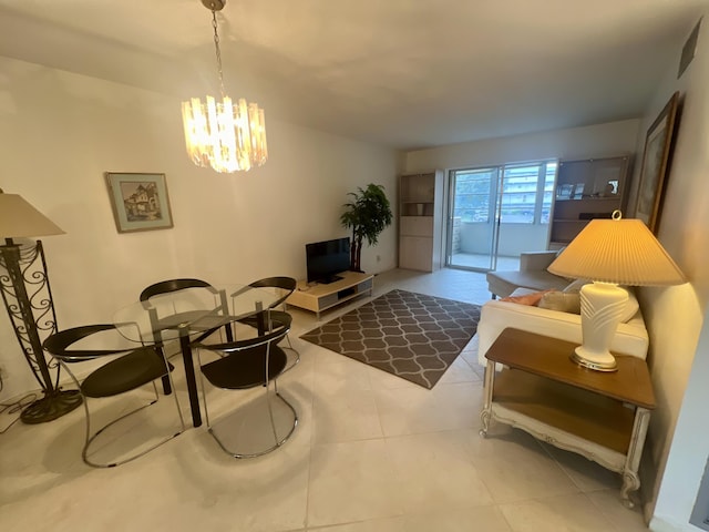 tiled living room with a chandelier