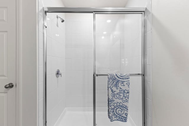 bathroom featuring walk in shower