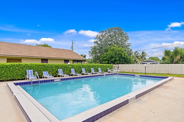 view of swimming pool featuring a patio