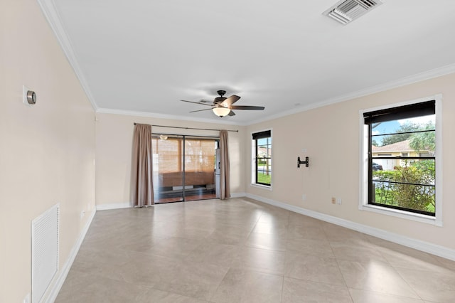 empty room featuring crown molding, light tile patterned floors, and ceiling fan