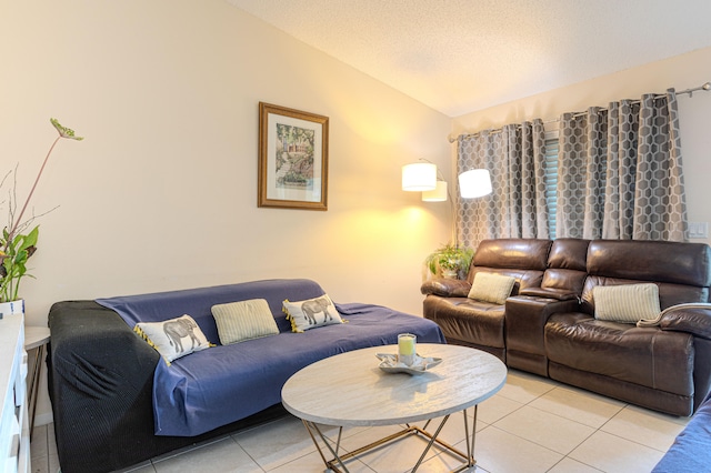 tiled living room with lofted ceiling and a textured ceiling