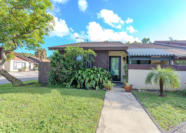 view of front of house with a front lawn